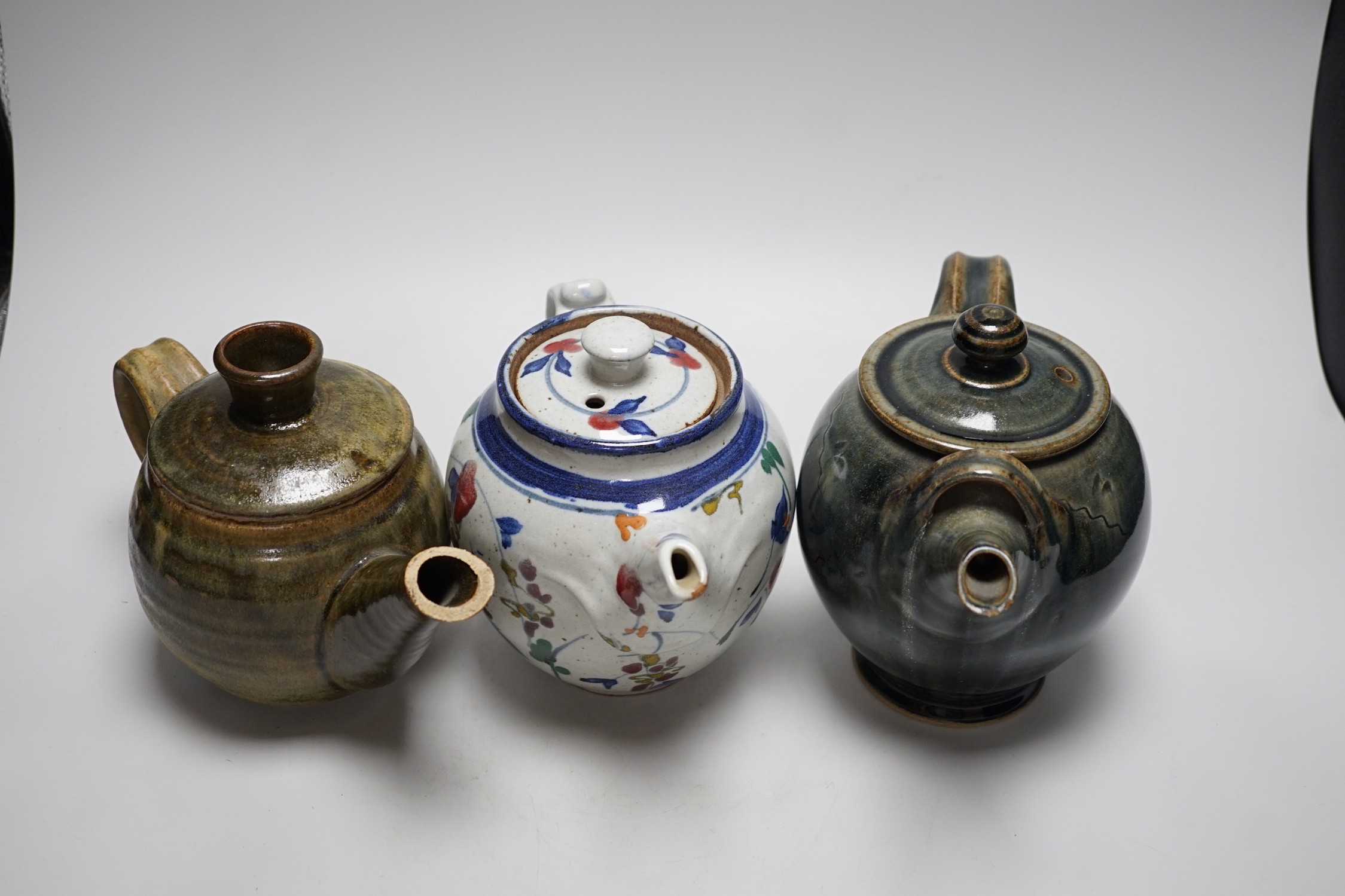 Three studio pottery teapots, 18cm